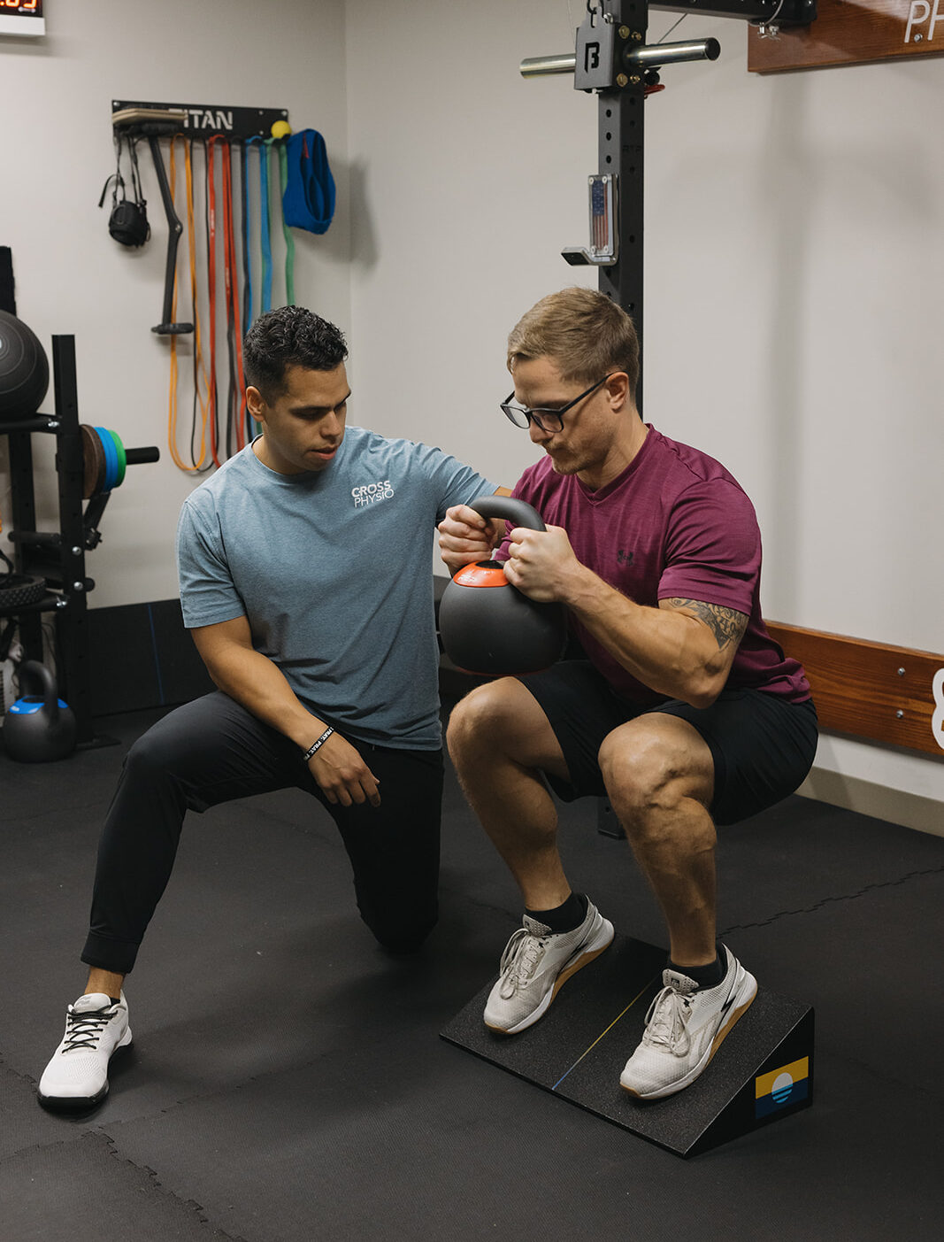 Cross Physio physical therapy, injury prevention, knee pain, squat pain-free, performance rehab